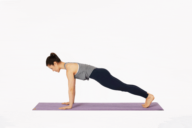 Front Support Pilates Exercises Woman in a push up position raising her legs up and down