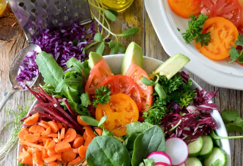 a bowl of salad with lots of vegies for the perfect clean eating meal