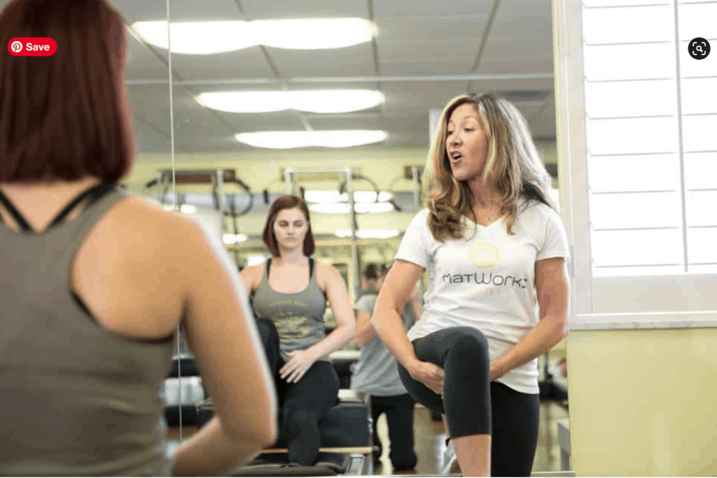 Pilates instructor teaching a class at MatWorkz