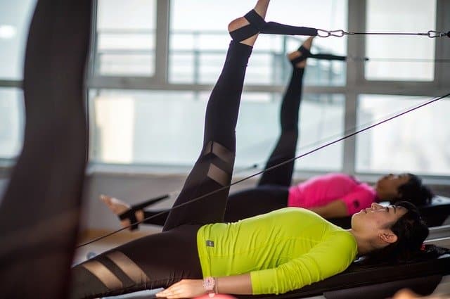 Woman toning hips and pelvis, one of the four areas of your body you can target with Pilates at MatWorkz Pilates